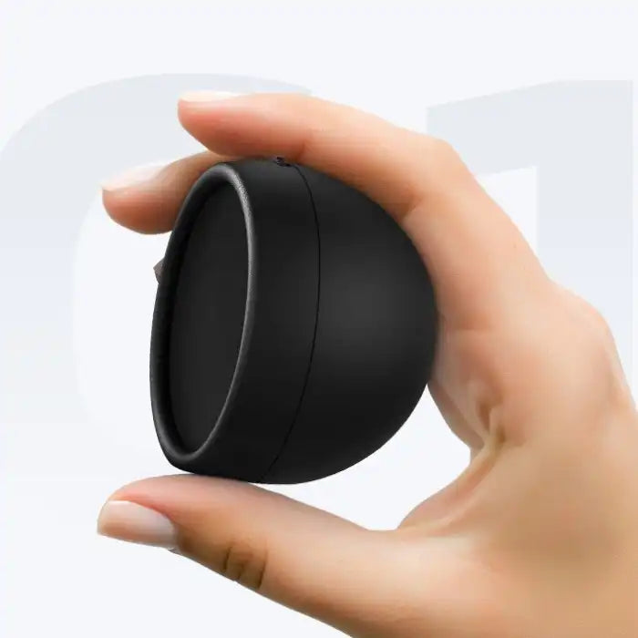 Apple CarPlay mini digital speedometer shown held between fingers for compact size reference