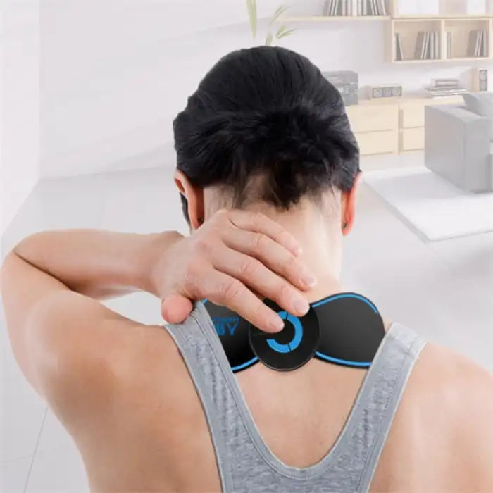 .Apple CarPlay neck massager in use for upper back pain relief at home with ergonomic wearable design.