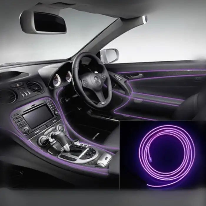 Purple LED kit lighting car interior dashboard, doors, and console with included light coil