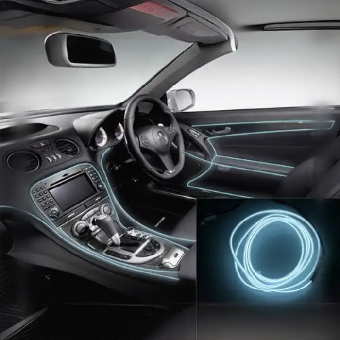 White car interior LED lights accent dashboard, center console, and doors with coiled strip view