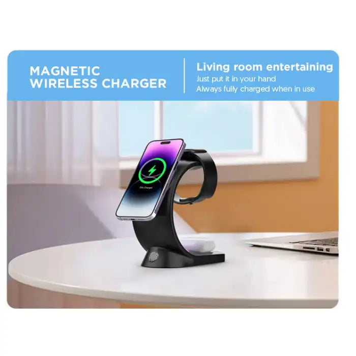 Wireless charging station shown in home setting charging phone, smartwatch, and earbuds on table.