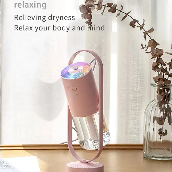 Pink humidifier misting by the window with calming light for dryness relief.