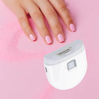 Infant nail clipper shown with trimmed nails and pink background for gentle grooming.