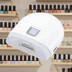 Infant nail clipper placed in salon environment with shelves of colorful nail polish behind.