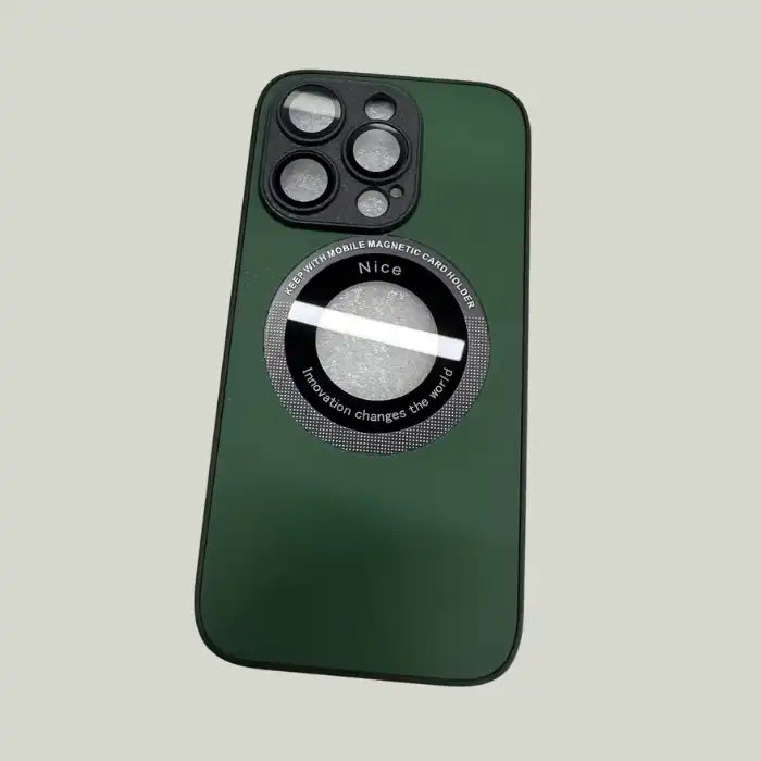 iPhone protective case in deep green with circular MagSafe ring on smooth surface