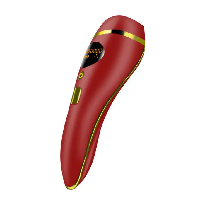Red laser hair remover with gold accents, ergonomic grip, and digital LED display for at-home use