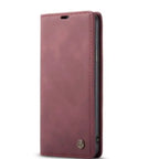 Leather phone case in rose pink with flip cover design and stitched edges for stylish protection.