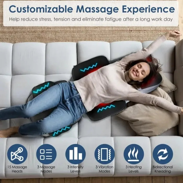Massager for chair in use on sofa with user enjoying adjustable intensity, vibration, and heat settings.