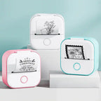 Mini Thermal Printer in pink, white, and mint colors printing holiday and floral artwork