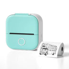 Mini Thermal Printer in mint color printing a black and white double-decker bus image