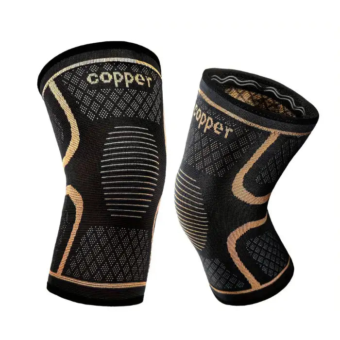 Set of two black and gold copper knee compression sleeves designed for joint support and pain relief.