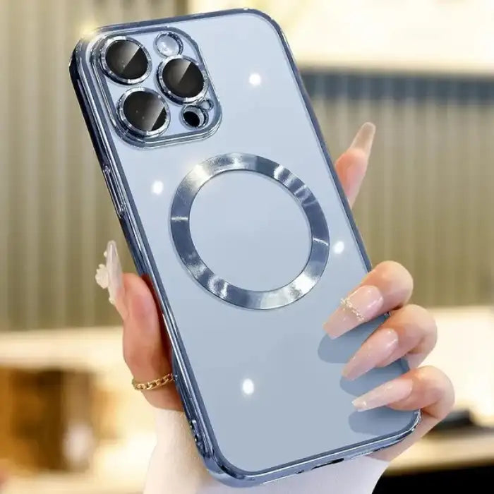 .Phone case with glossy light blue back and magnetic ring, held with long pink nails