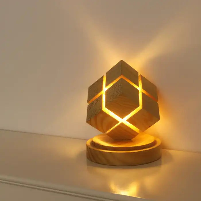 Rubix cube night light with battery power illuminating wall with soft glowing pattern