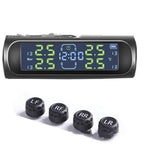 Solar TPMS system with bright green digital display and four external tire pressure sensors.