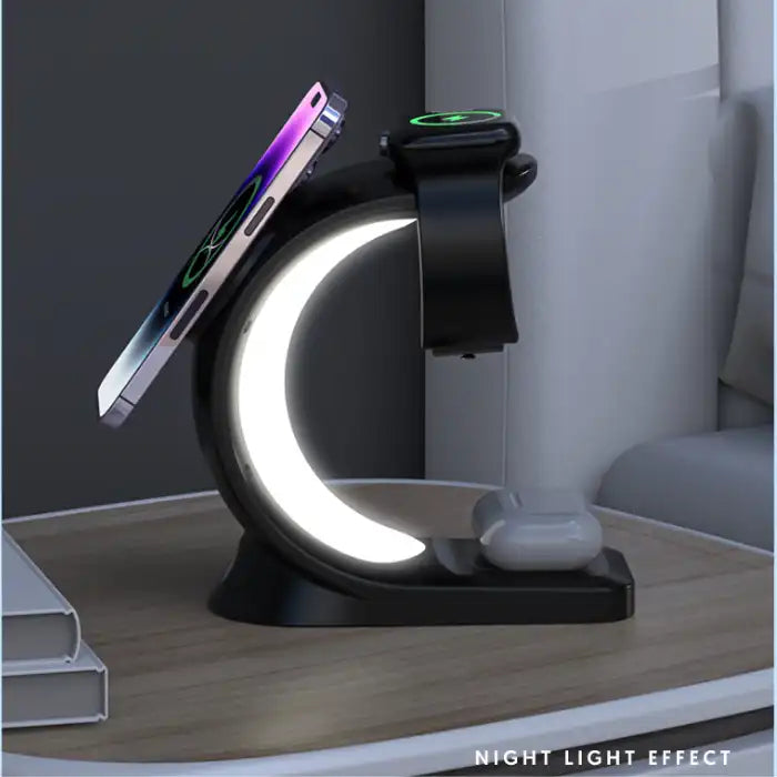 Wireless charging station in dark setting with white arc light charging phone, watch, and earbuds.